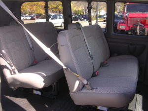 Shot of the passenger van's rows of seating.