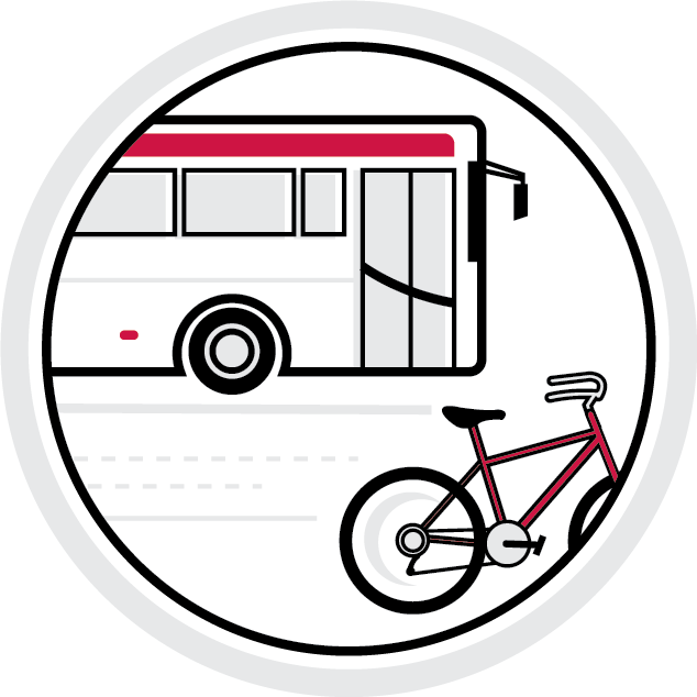 Red and white colored circular transportation icon, includes a bus and bicycle near each other on the road.