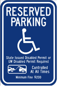 Image of parking stall sign reserved for Wisconsin DOT Disabled permit parking. Those with an annual or temporary UW-Disabled parking permit may also park in stalls with this sign.