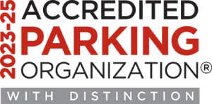 Logo from the International Parking Mobility Institute with the text 2023-25 Accredited Parking Organization with Distinction